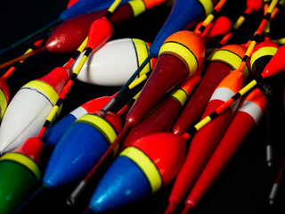 Fishing bobbers creating a colorful and vibrant pattern © VexoraImages