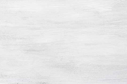   White wood background. Wooden shabby texture of the old table. Wooden plank with natural pattern and texture.