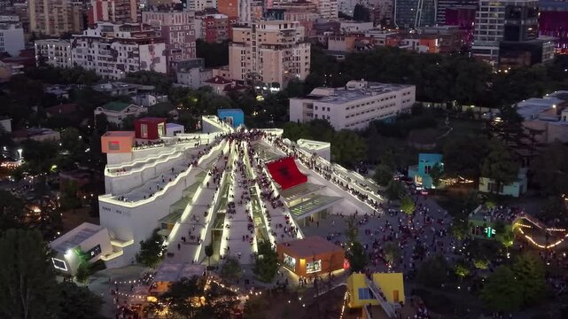 Drone View Over pyramid Building with albanian flag and Tirana Protest, 20 June 2026