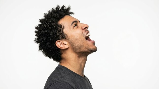 Man shouting or singing with head tilted back on plain background isolated on white background