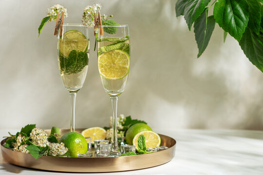 Refreshing Hugo cocktails with elderflower, lime, and mint