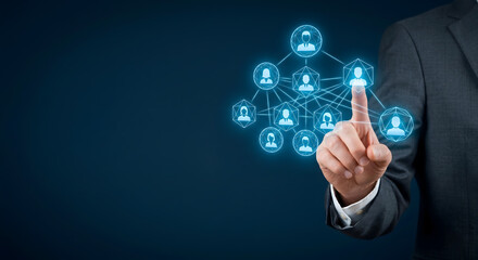 Fototapeta premium Hand touching glowing social network connection map representing global communication and teamwork link.
