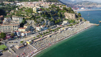 Obraz premium Beautiful aerial view of Marina di Vietri beach with turquoise sea and cliffs