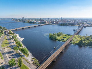 Obraz premium Aerial panoramic view of Riga Old Town, Railway Bridge and Daugava River in Riga, Latvia