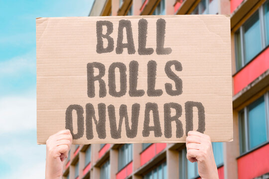 "Ball rolls onward" Game continues despite geopolitical turmoil. PERSIST. CONTINUE. RESILIENT. UNAFFECTED. FLUID.
