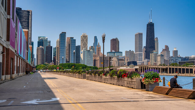 Chicago, IL - July 26, 2024: Navy Pier and city skyscrapers on a beautiful summer morning