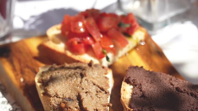 Crostini and Italian appetizers served on a table in a traditional Italian restaurant