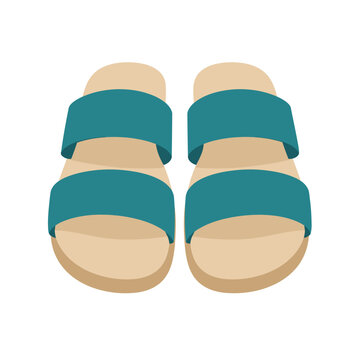 Footwear with two wide straps sits on a flat surface. The design is simple, with a light color for the base and a darker shade for the straps. The setting is casual and straightforward