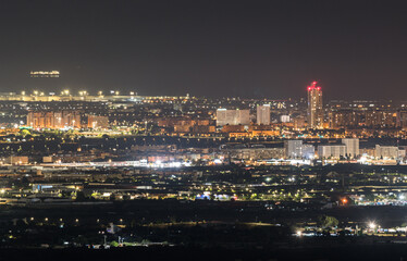 Fototapeta premium Valencia Cityscape at Night Featuring Torre de Francia and Modern Urban Architecture