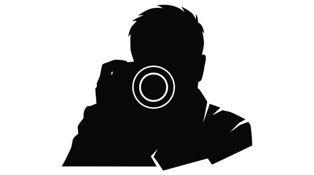Silhouette of a person holding a camera, capturing a moment with focused intent