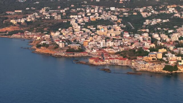 Beautiful Old city, Greece and best scenic places - panorama of picturesque old town Chania. Crete island, Panoramic of the old Venetian port and lighthouse during the blue hour, Travel Concepts