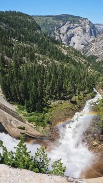 Breathtaking footage captured at the top of Nevada Fall, where the Merced River rushes across smooth granite before plunging into the canyon below