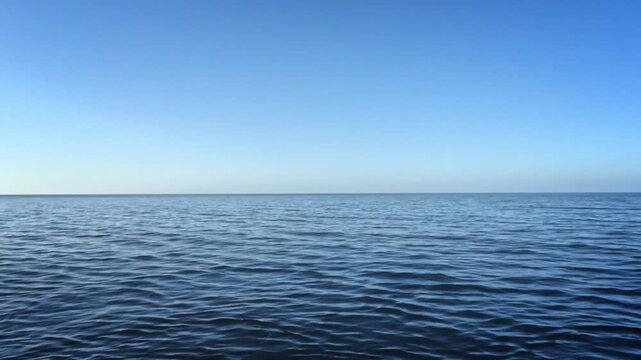 Stunning ocean view from a cruise ship. Nothing but deep blue waters and open skies