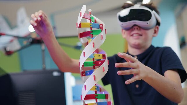 Child wearing VR headset learning with AI education with DNA model and digital robotics in classroom, concept future technology innovation.