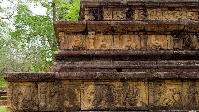 Ancient stone carvings depicting elephants and lions in sri lanka