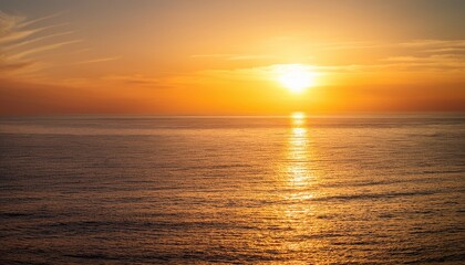 Fototapeta premium Golden Sunset Over Tranquil Ocean