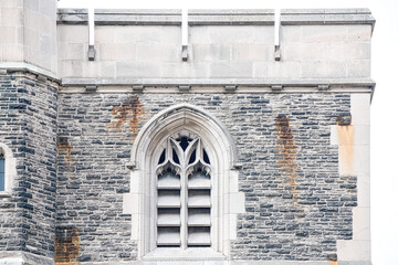 Fototapeta premium Colonial tower window. Ancient architecture in Toronto, Canada