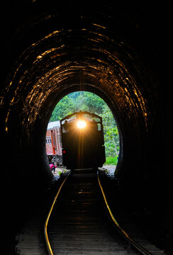 Image of the train running along the Tunnel of Nine Arches Bridge located in valley Demodara, Ella, Sri Lanka, Asia	