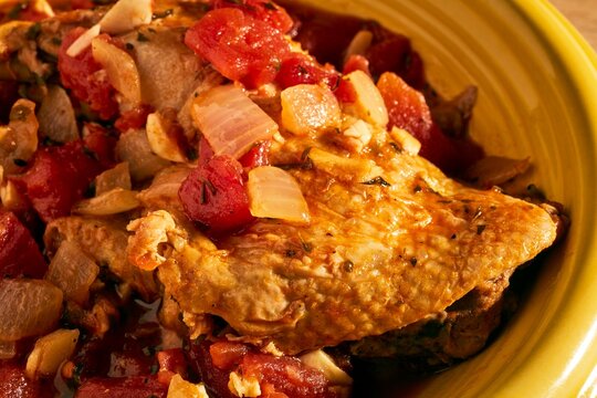 Ostropel, Romanian chicken with garlic and tomato.
