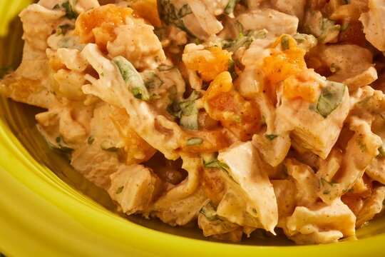 A bowl of Coronation Chicken. The classic British salad.
