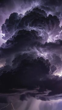 Vertical video: Charging thunderhead pulsing with internal flashes, dropping rain shafts at dusk