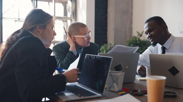 Women in office, vertical portrait of two female colleagues in meeting room, ladies discussing sale plane. Marketing departments workers thinking about company development, female emancipation
