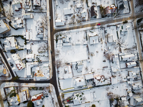 Aerial view of the snow-covered Majori district with residential houses and streets in Jurmala, Latvia.