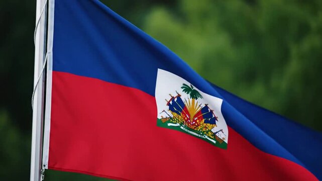 The national flag of haiti waving in the wind