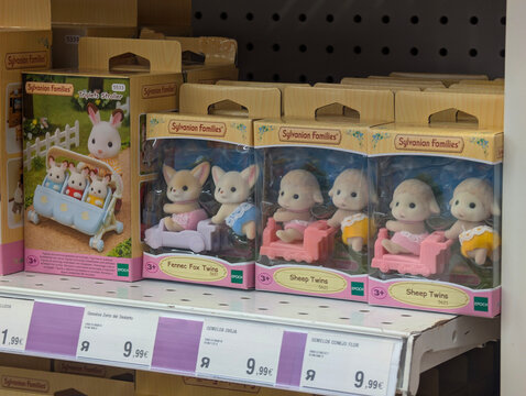 Palma de Mallorca, Spain - June 20, 2026: Sylvanian Families miniature animals and dollhouse playsets in retail display. Calico Critters, Toys R Us, fennec fox twins, rabitt triplets, sheep twins.