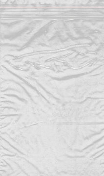 Crumpled transparent plastic bag texture with ziplock top, heavy wrinkles, and glossy highlights for realistic product mockup overlay. PNG template