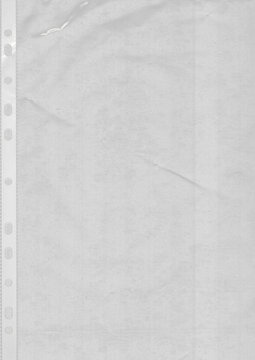 Transparent Binder Sleeve Plastic Texture PNG. Transparent punched binder sleeve texture with glossy plastic film, subtle scratches, wrinkles, dust, and perforated margin. PNG mockup