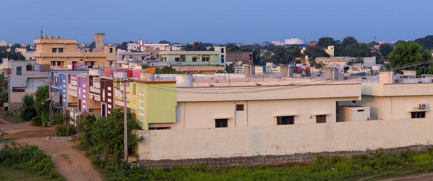 India residential neighborhood with colorful buildings and houses