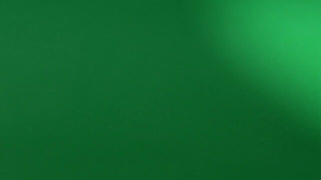 A smooth and solid dark green background surface texture