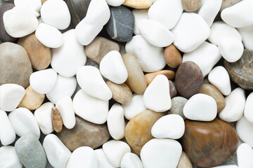 White pebble stones as background, top view © Liami