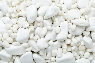 White pebble stones as background, top view © Liami