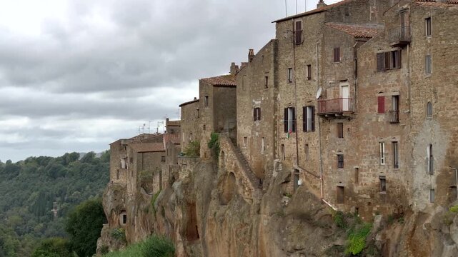 Aerial Drone view of hilltop Medieval town of Pitigliano, Tuscany in Cloudy Weather, with Valdorcia and old buildings
