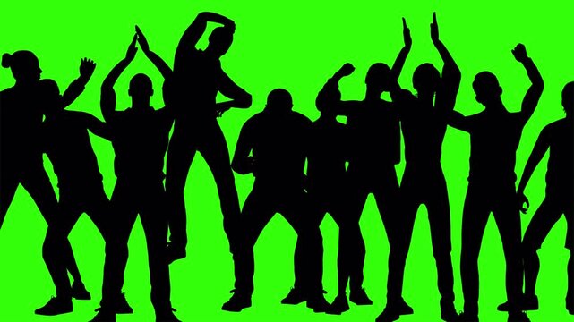 Group of people dancing in silhouette against a green screen background.