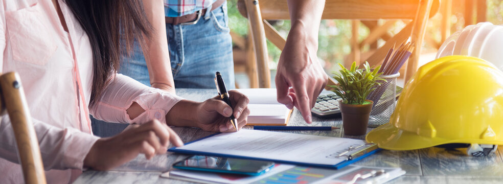Banner construction engineer office desk architect workplace. Diversity Coworker Engineer team hands partnership. Support team greeting teamwork colleagues with copy space. Banner Teamwork Warehouse