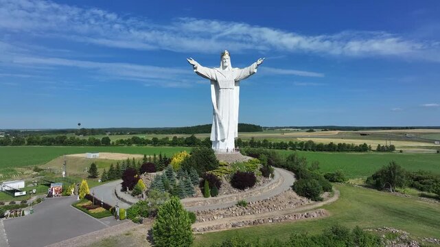Aerial Christ the King statue Poland close. King of the Universe in Swiebodzin, Poland, completed 2010. 33 meters, symbol of Jesus age at his death. Pilgrimage and tourist extraordinary.