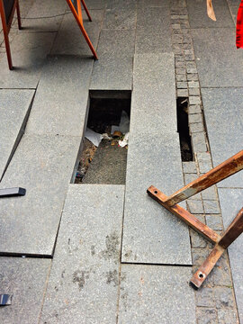 June 22, 2026 - Belgrade, Serbia. The hole that opened on the street which is a pedestrian zone in the city center on Trg Republike.
