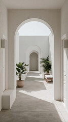 Fototapeta premium A bright hallway leads to an arched doorway with potted plants on either side