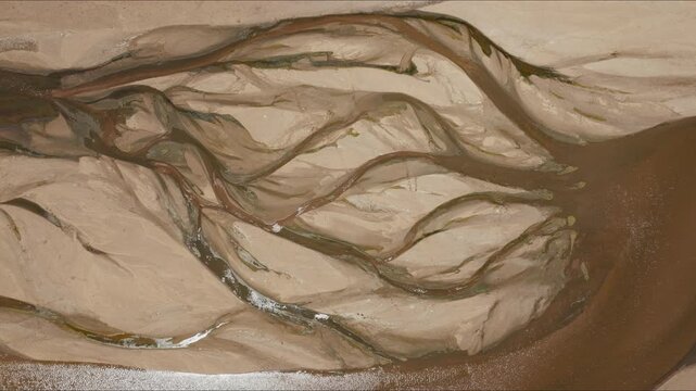 Top down drone shot of Runde River textures and sand patterns in Gonarezhou National Park, Zimbabwe