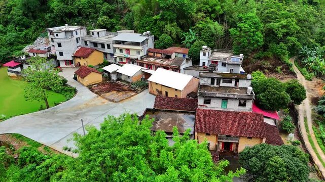 Rural Karst Settlement with Ancient Mud Houses and Modern Brick Houses, Bamboo Grove Aerial