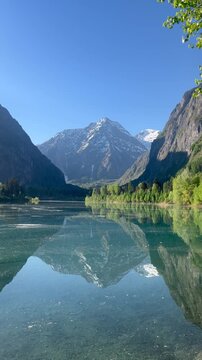 in this lake of France the life is awesome with turquoise color of a mountain in a trasparente lake