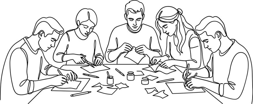 Group of students collaborating on a creative craft project at a table.