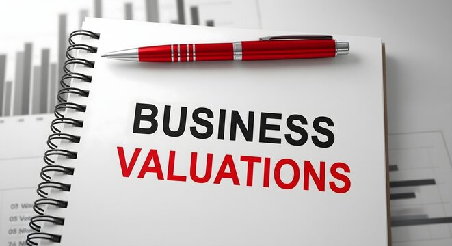 Business Concept With Business Valuations Message On Notebook Pen A...