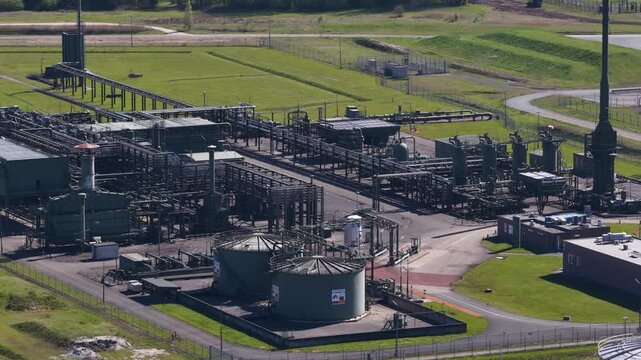 Aerial drone view of underground gas storage Grijpskerk, showing compressors, gas drying, pipelines, flare stack and energy infrastructure.