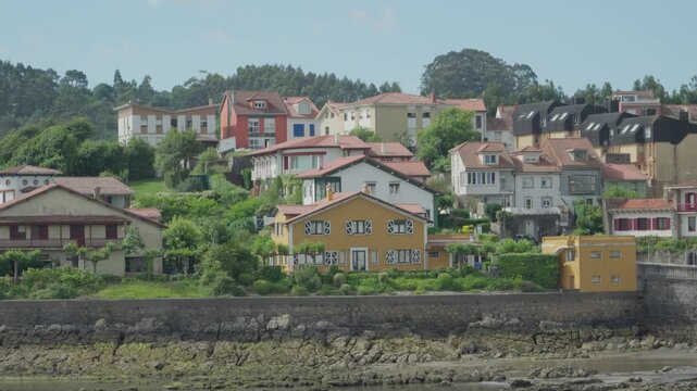 Colorful Coastal Village Landscape Along the Shore in Luanco, Asturias, Northern Spain