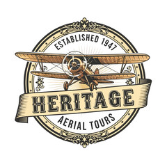 Heritage Aerial Tours biplane logo with propeller and flight wings. © City