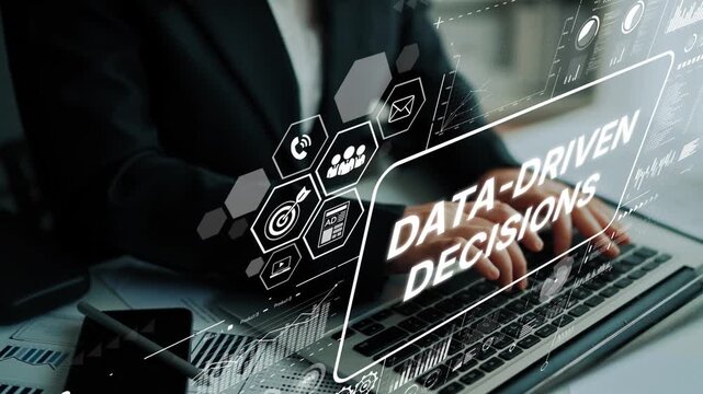 Business professional working on laptop with overlay of data-driven decisions concept, technology, and analytics imagery. Asymptotic smart data analytic.